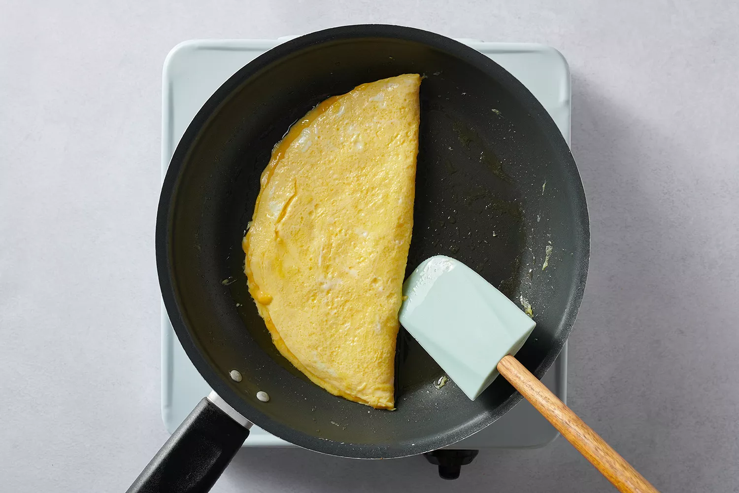 ovos cozinhando na frigideira