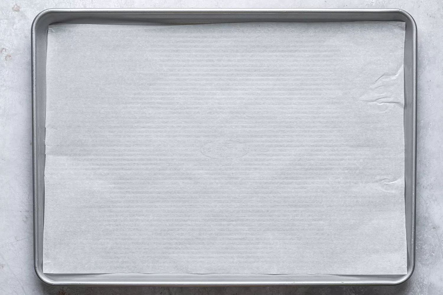 assadeira forrada de papel manteiga